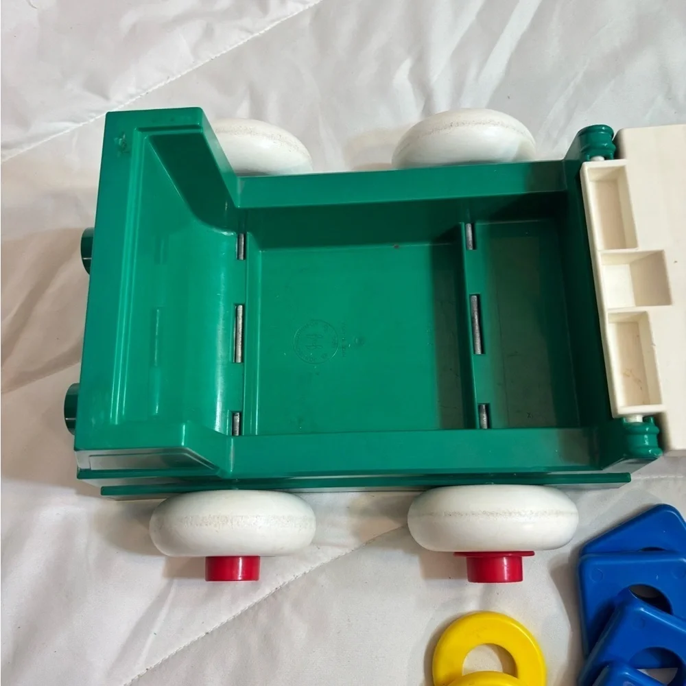 Vintage 1983 Johnson & Johnson Stack And Dump Lift Truck Vehicle with 15 Shapes